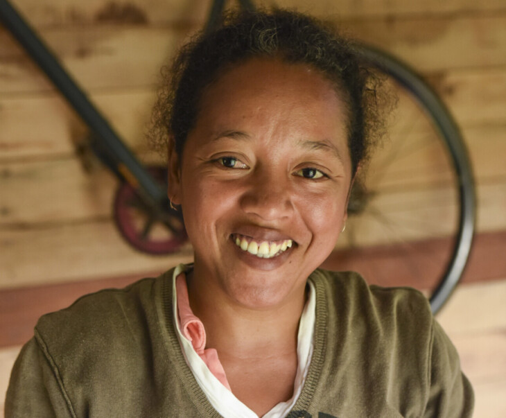 Madame Félicité sorts her vanilla beans and prepares them to be curated.