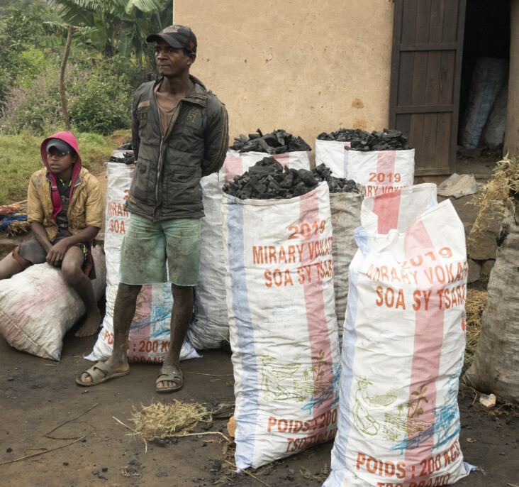 Charcoal is the main cooking fuel in Madagascar and its production has depleted forests and left many species of plants and animals threatened. These bags of charcoal will sell for about $3 each. Photo by David Snyder/CRS.