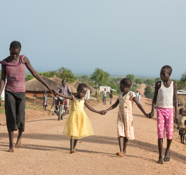 Annet and her siblings have faced a difficult road. And while life remains challenging, Annet sees a bright future for them. What I see in the future for my family and siblings is to grow through education,” she says. “I hope we can be self-reliant in the future.” Photo by Philip Laubner/CRS.